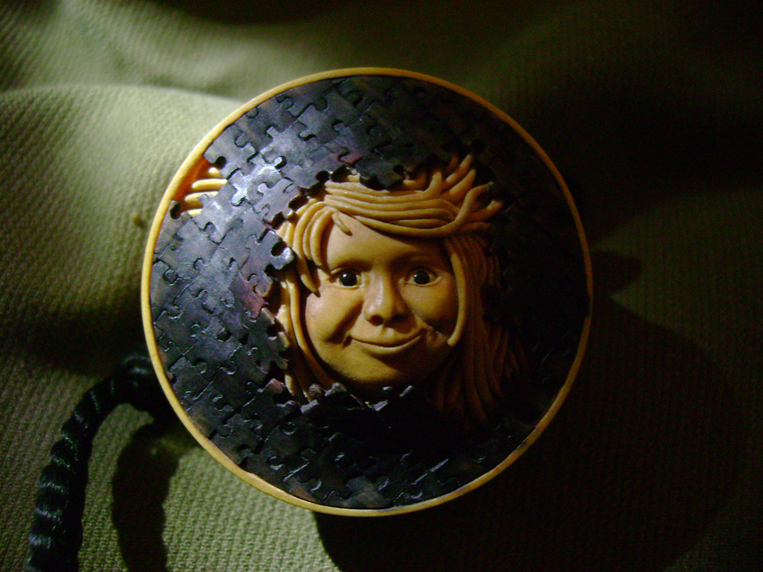 Breaktrough, Durchbruch, puzzle, face, Cornel, Schneider, Boxwood, Buchsbaum,&nbsp; jpeg, jpg, scuplture, Schnitzerei, Carving, netsuke, manju